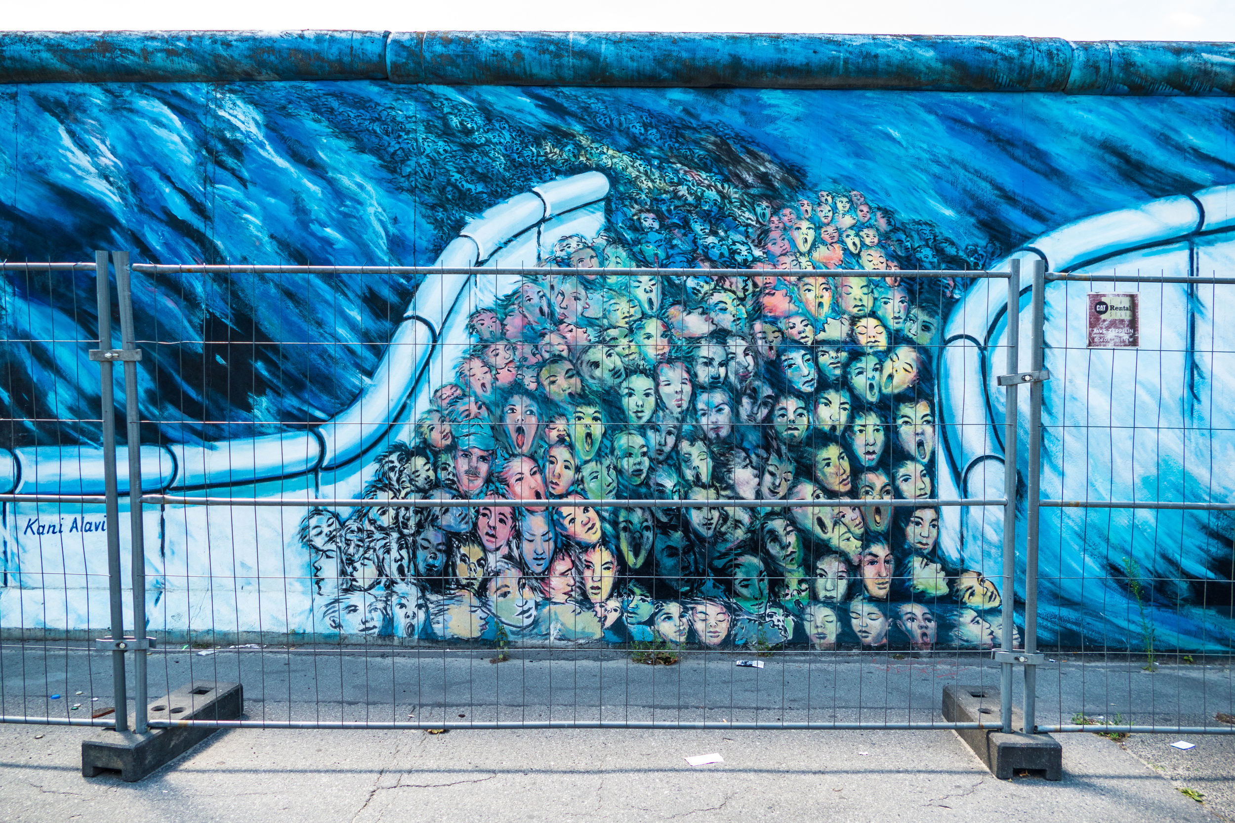 East Side Gallery picture of escape through the Berlin Wall (but trapped behind the barriers).