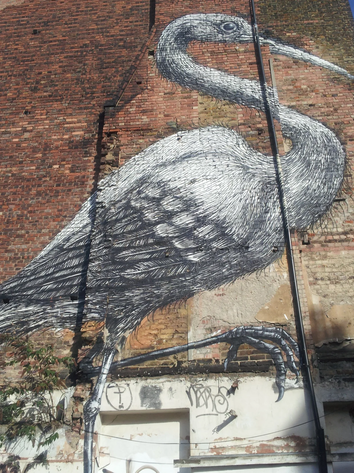 Another mural by the same artist in Brick Lane, London