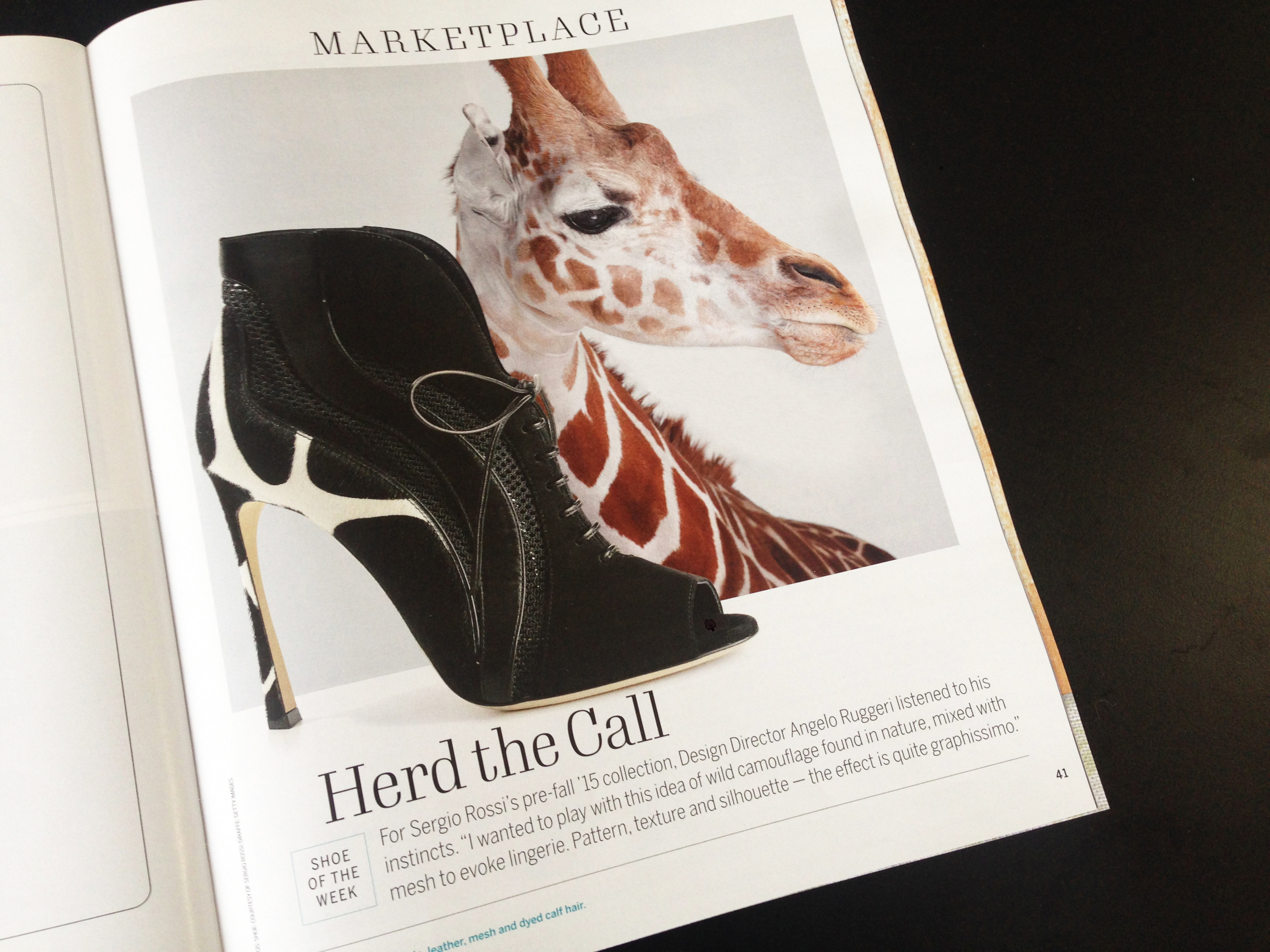 Shoe of the Week, the Marketplace opener. This page posed a problem during production in that my concept for the page called for an image of a shoe photographed in an environment, but we only had a shoe on white. I thought I might be able to fake a background using animal print, but did one better when I stumbled upon this stock image giraffe. Turned out to be my favorite page of the issue! 