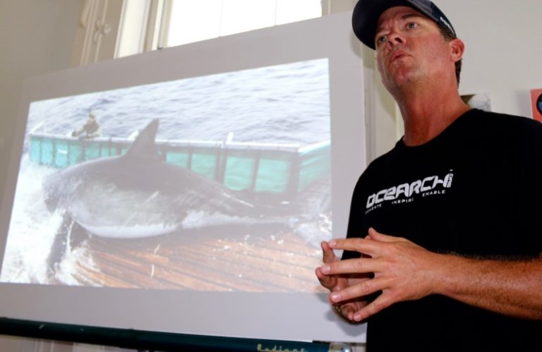 Chris Fischer, TV fishing show host and founder of Ocearch, tells a standing-room-only crowd at the Sag Harbor Whaling Museum on Saturday, August 27, about the organization’s effort to tag great white sharks and collect data to prove that they breed…