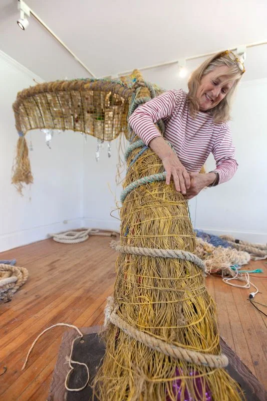 Cindy Pease Roe at work on her whale.