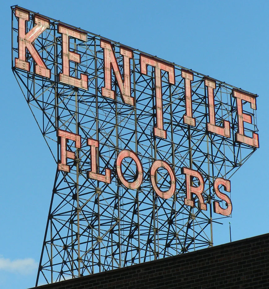 City signs like this one and the Silver Cup sign in Queens inspired the cover.