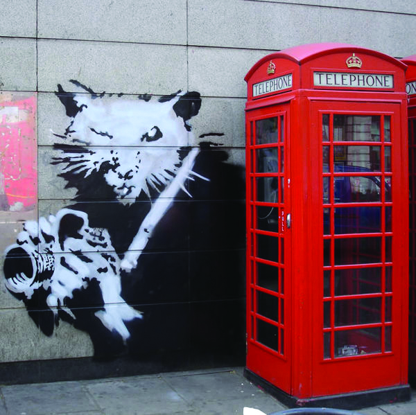 Banksy's graffiti style inspired the cover direction
