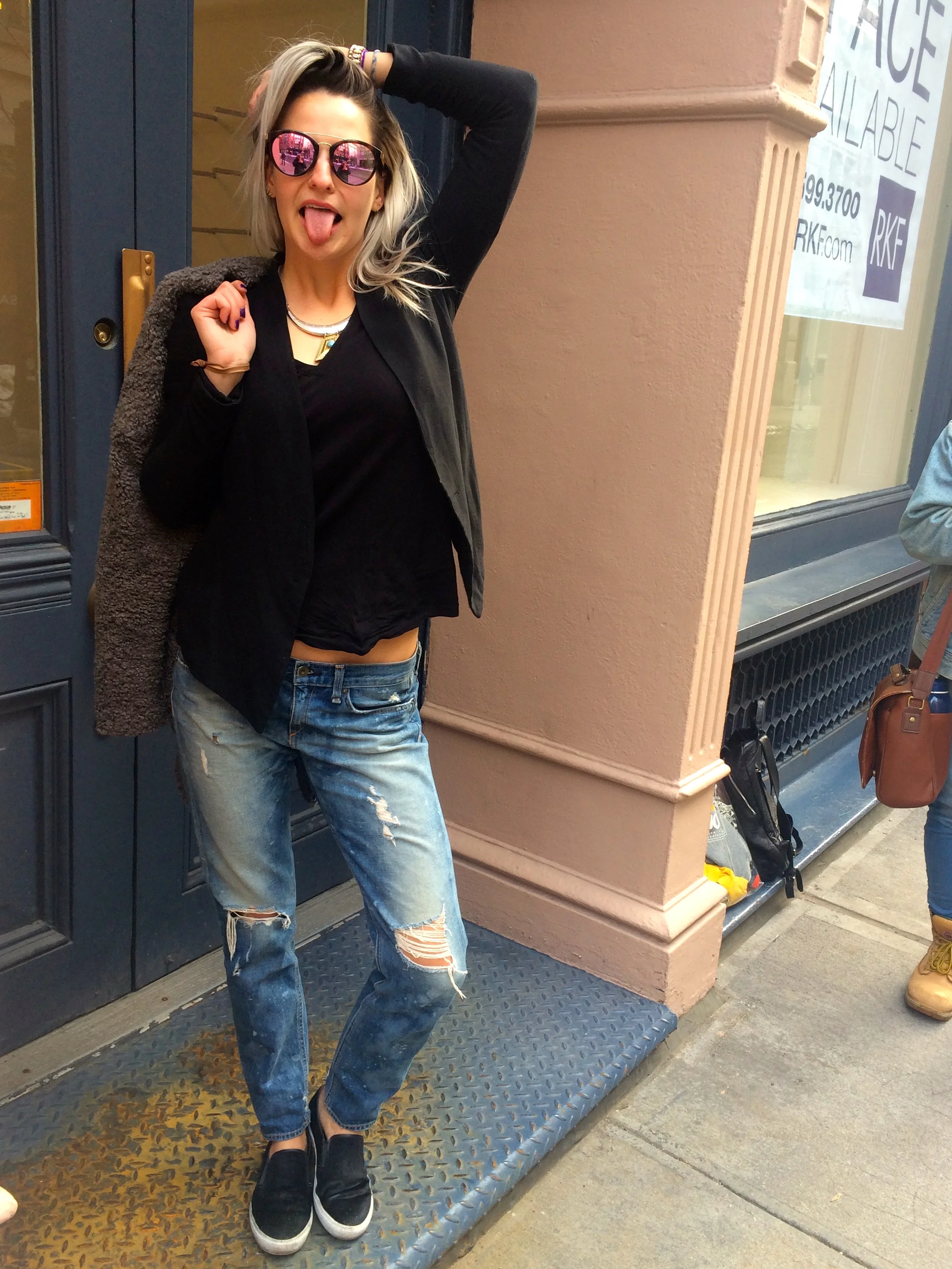 Glasses: Firmoo, Blazer: Helmut Lang, Necklace: Nordstrom, Earrings: Bauble Bar, Jacket: BCBG, V Neck Tee: J.Crew, Jeans: Rag & Bone, Pony Hair Slip Ons: Kenneth Cole Reaction. Location: Soho, New York. Photos: Elena Baltzoglou