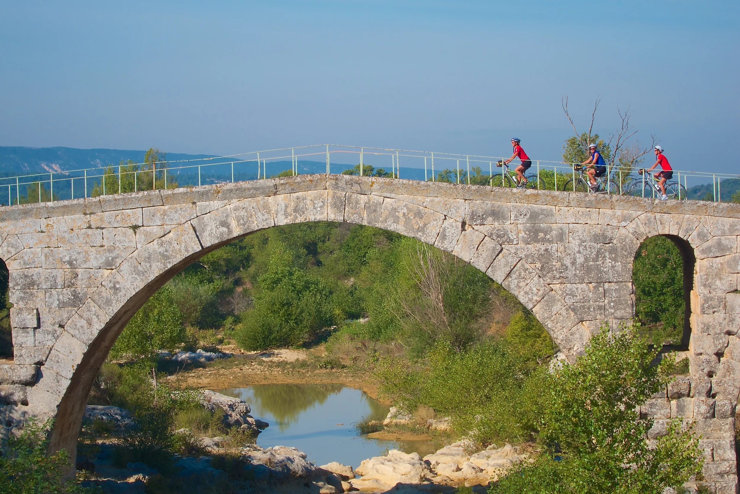 Riding Across Pont Julien.jpg