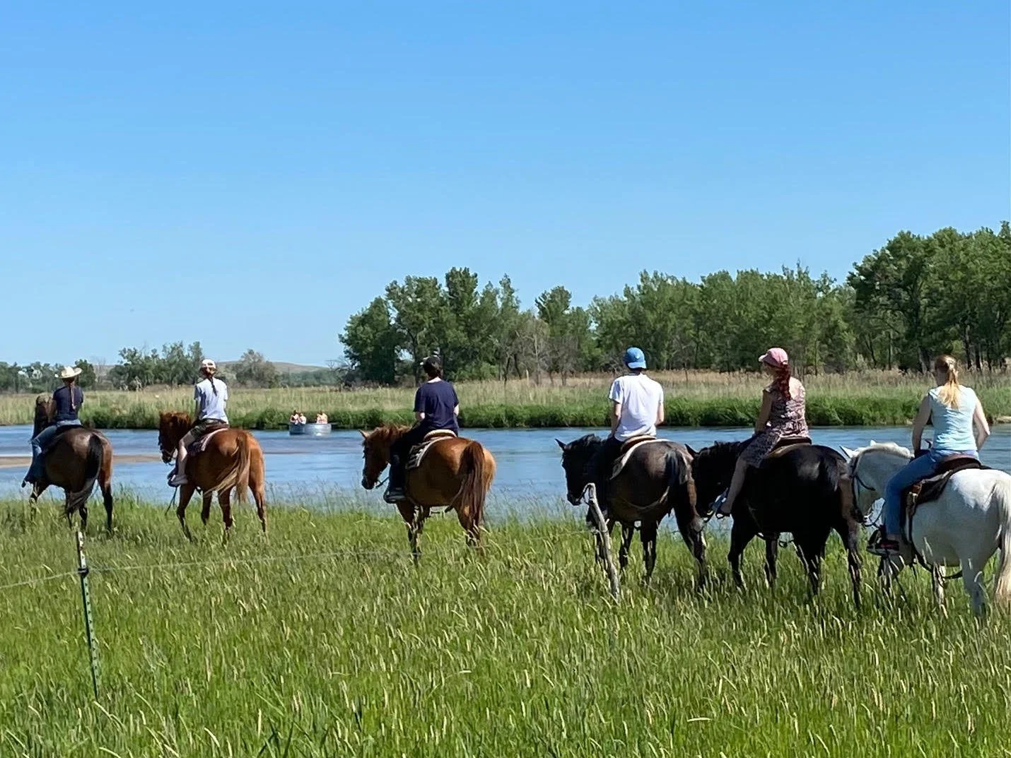 Ride and tank by river.jpg