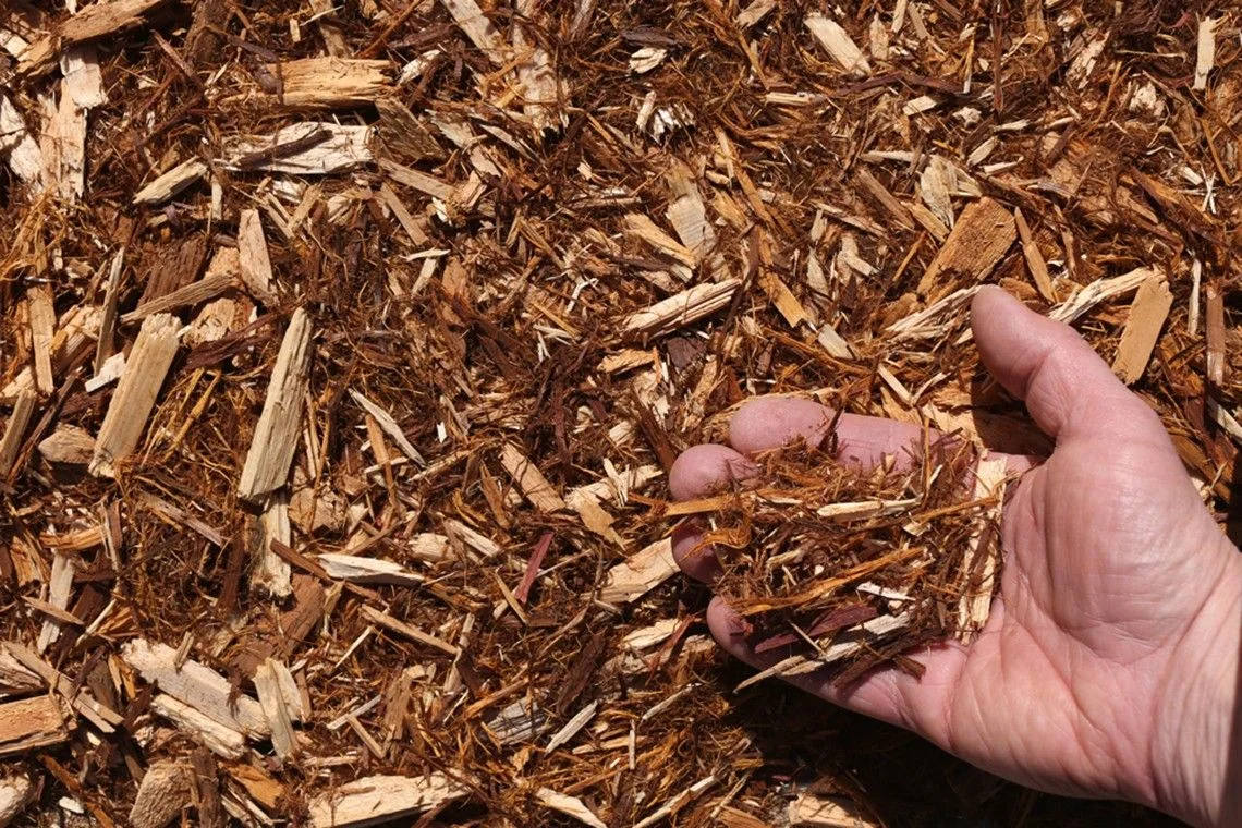 white-cedar-mulch-hand-compressor.jpg