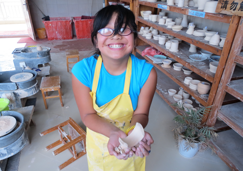 Lily working on the cup in China