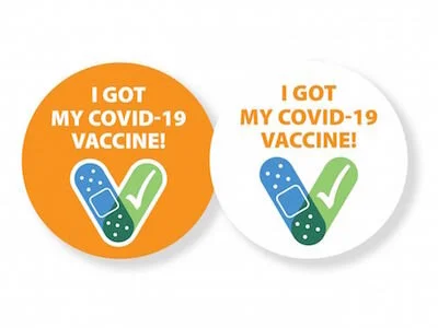 Wear a Sticker Saying You Got the COVID-19 Vaccine? The CDC Thinks It Could Help