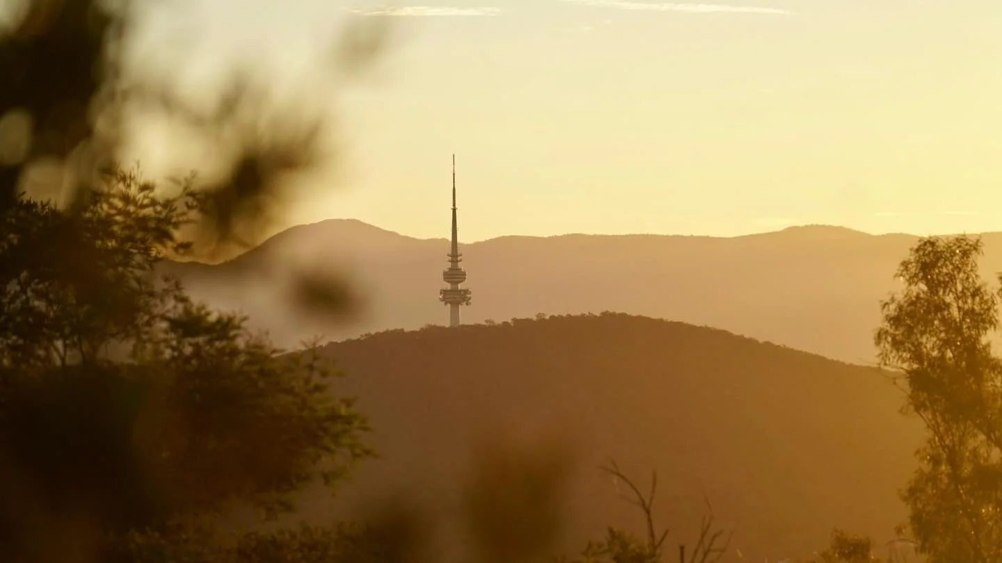 Golden hour. Canberra.

&mdash;

Telstra Tower in Canberra is pretty iconic, towering over the beautiful city. 

But its view from Mount Ainslee, at sunset, behind the rolling hill, in the fading light, with the golden hue is otherworldly.

One of my