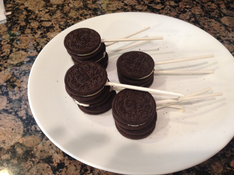 Let cookies harden before dipping. Put in the fridge or freezer for a minute to set quicker.