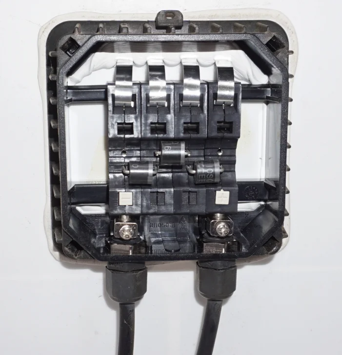 Inside a junction box of a typical 60 cell solar panel showing the 3 bypass diodes