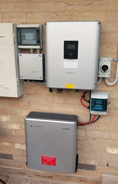 Sungrow hybrid inverter with battery and backup power box.