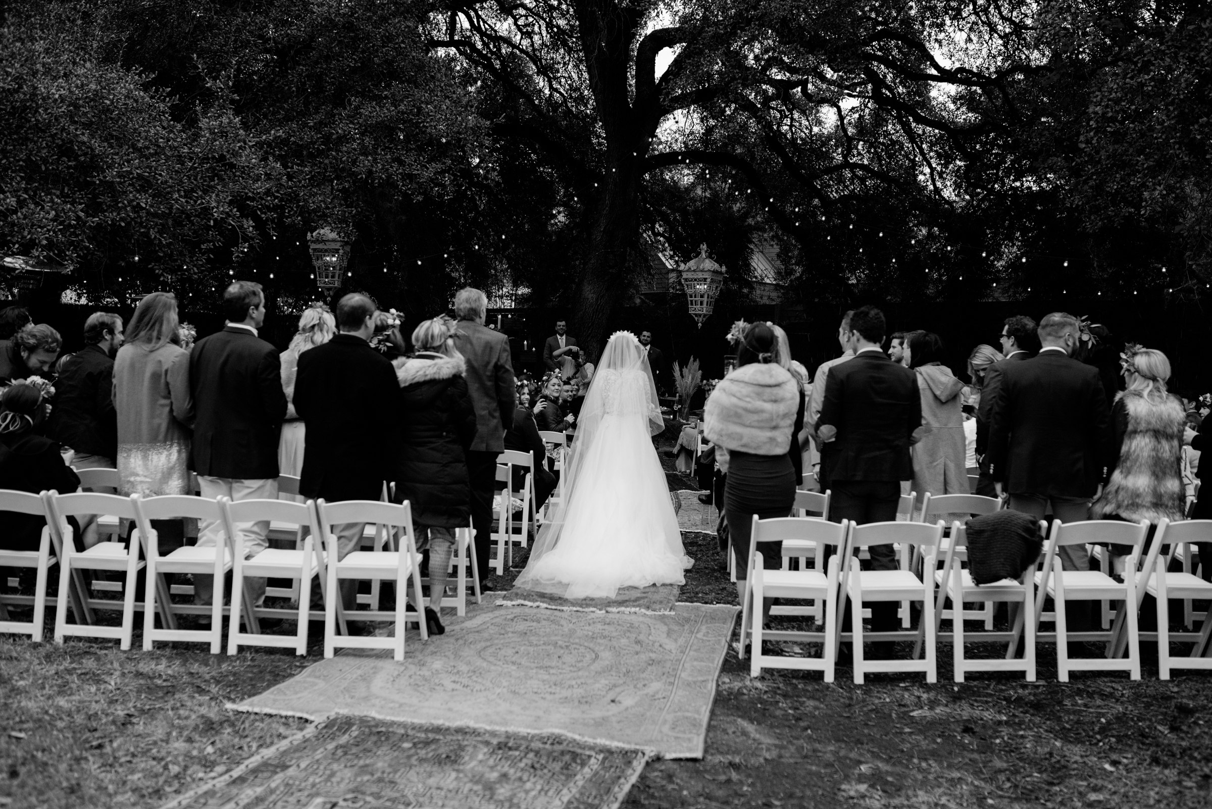  boho bride walking down the aisle wedding ceremony vuka collective austin texas 