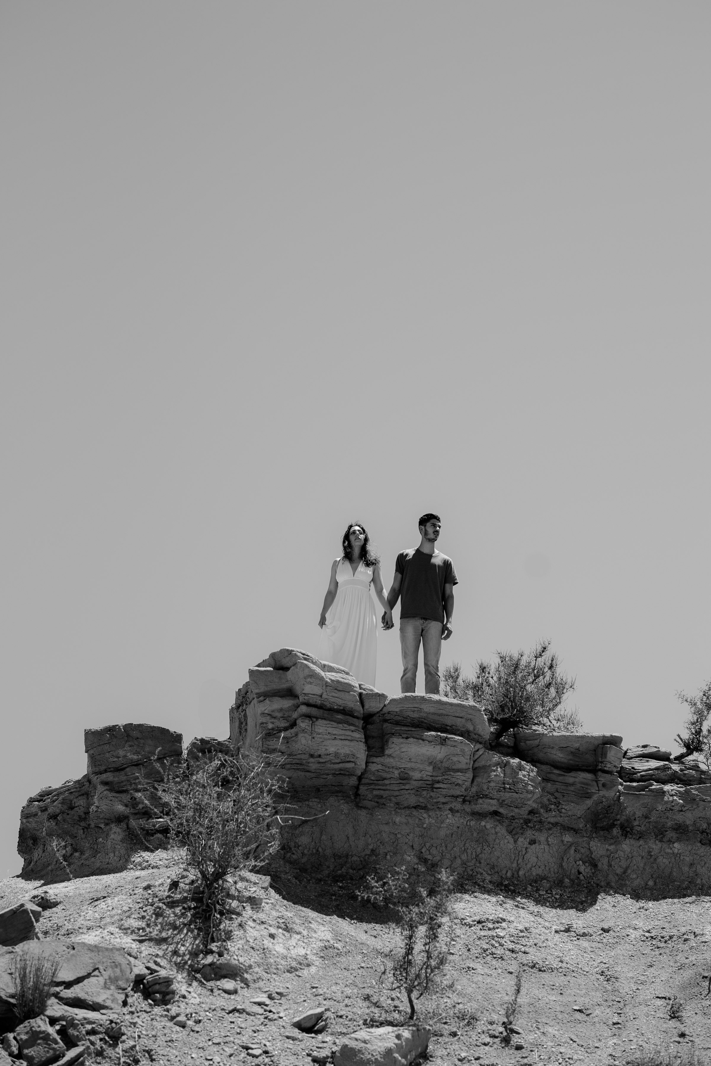  couple standing on top of rock big bend national park engagement session 