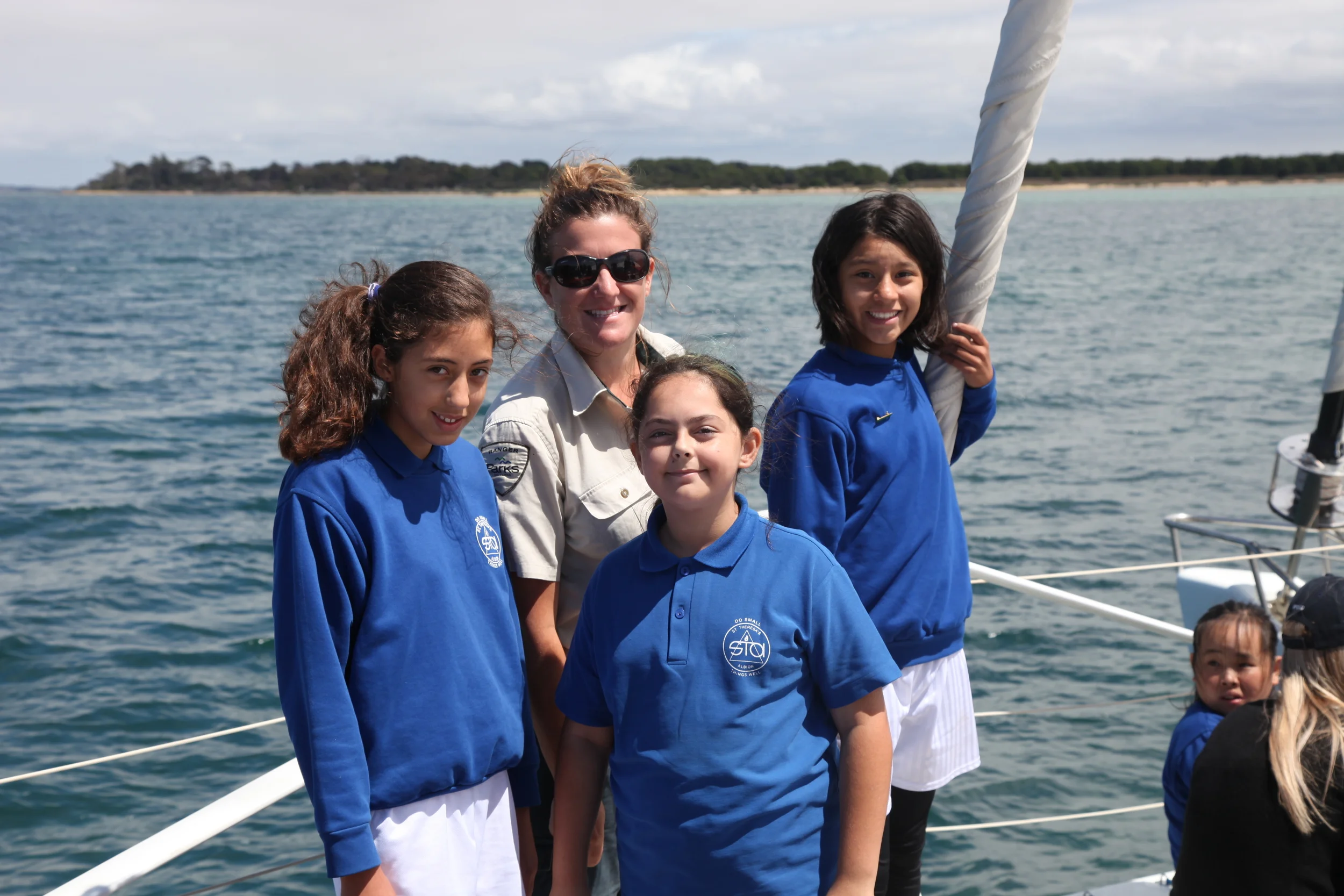 Jess from Parks Victoria with kids from St Teresa's Catholic Primary during Two Bays 2016