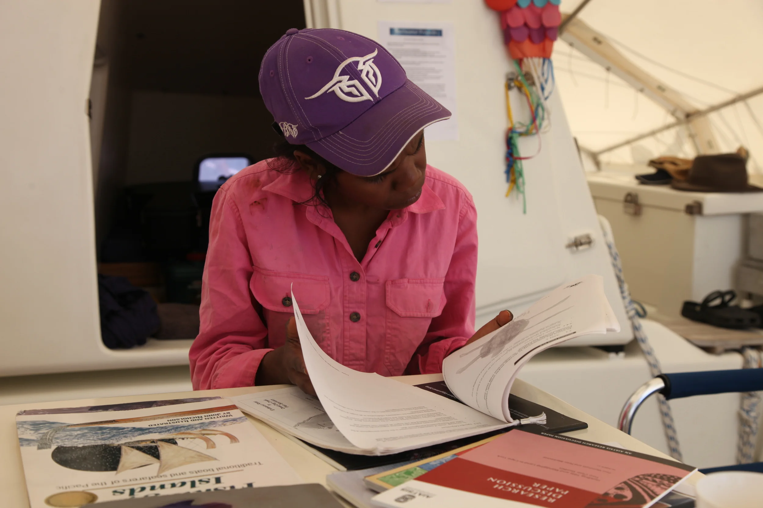 Shaunica Reading the Hope Vale Turtle and Dugong Sea Country Plan