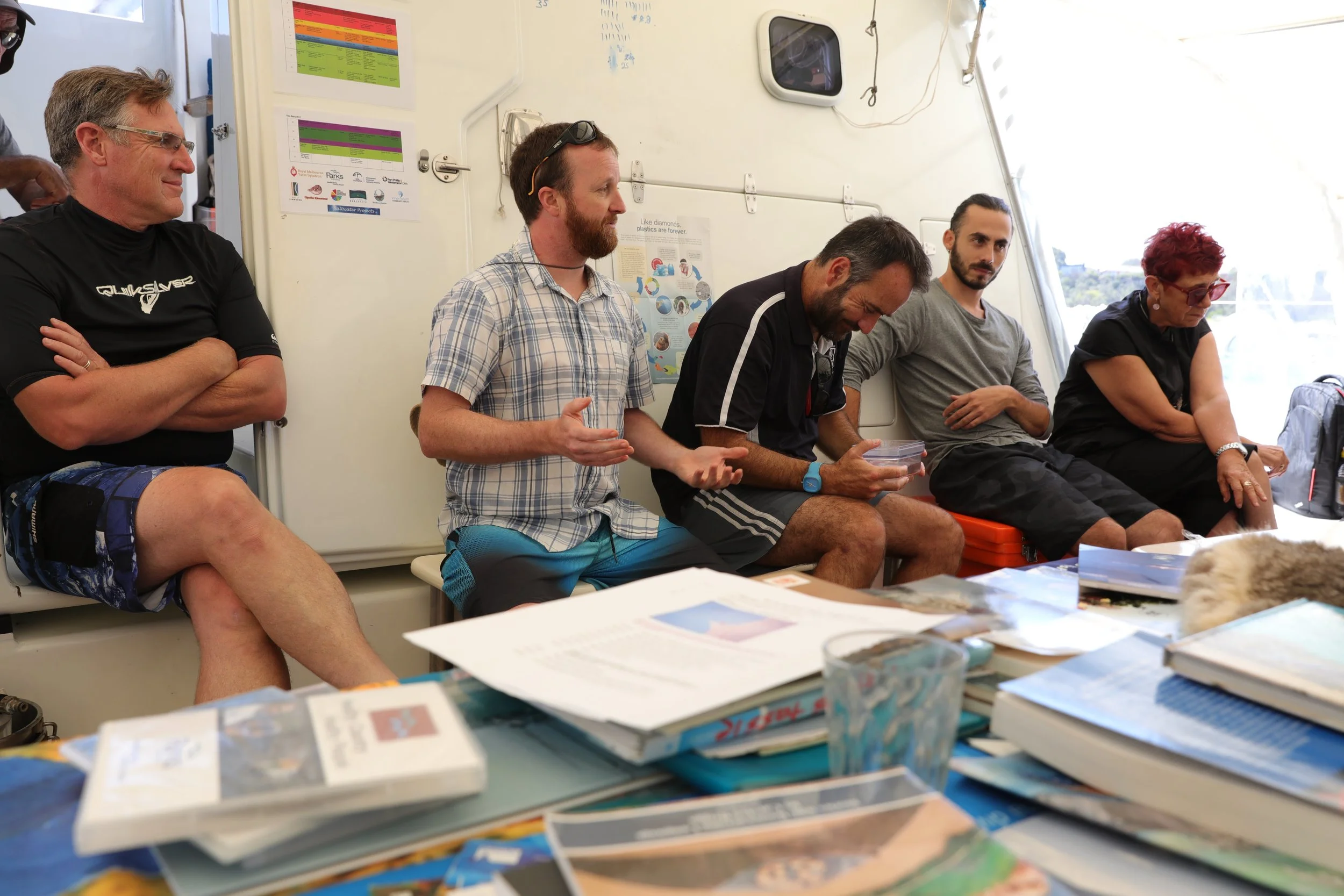 Simon sharing the Reef restoration project on board Pelican1.