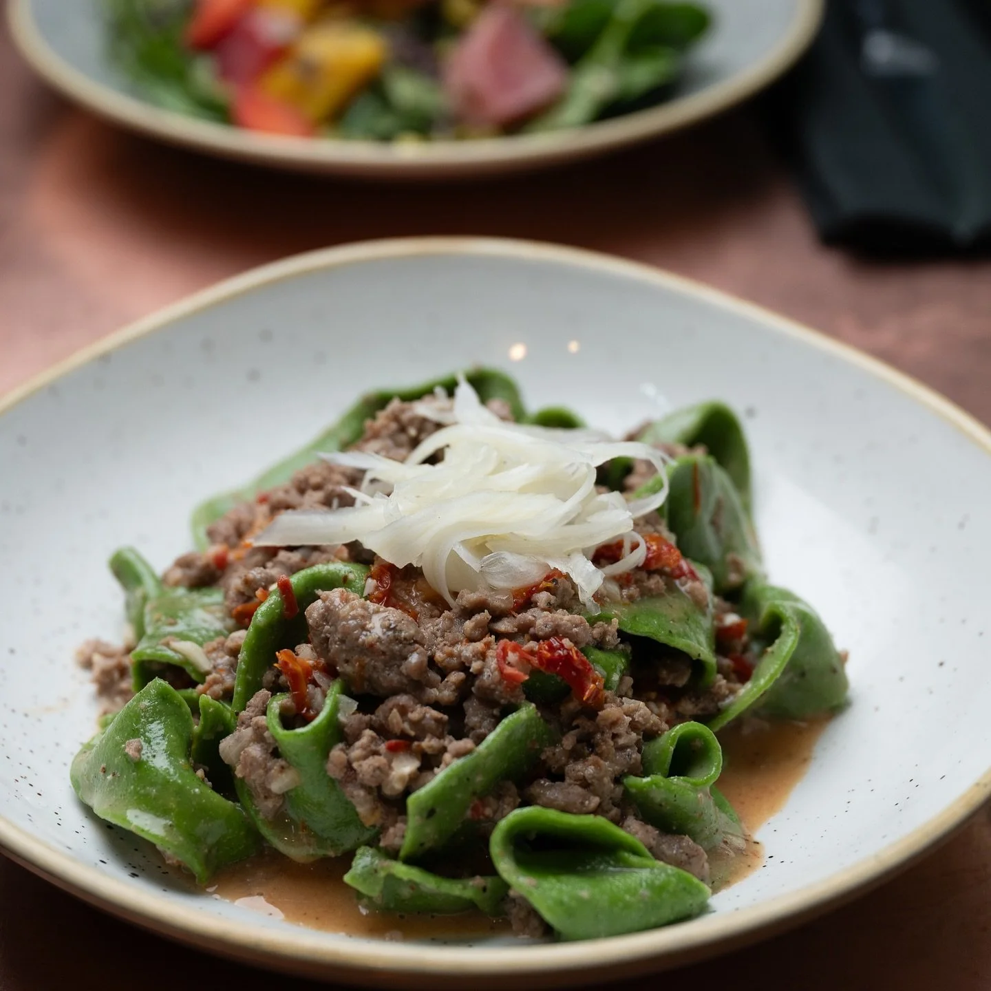 Hand-cut, house-made, and full of soul. Our Spinach Pappardelle brings together sun-dried tomatoes, savory pork sausage, and a silky ginger-ember cream sauce that hits every note—bright, rich, and just a little unexpected.
Made from scratch in