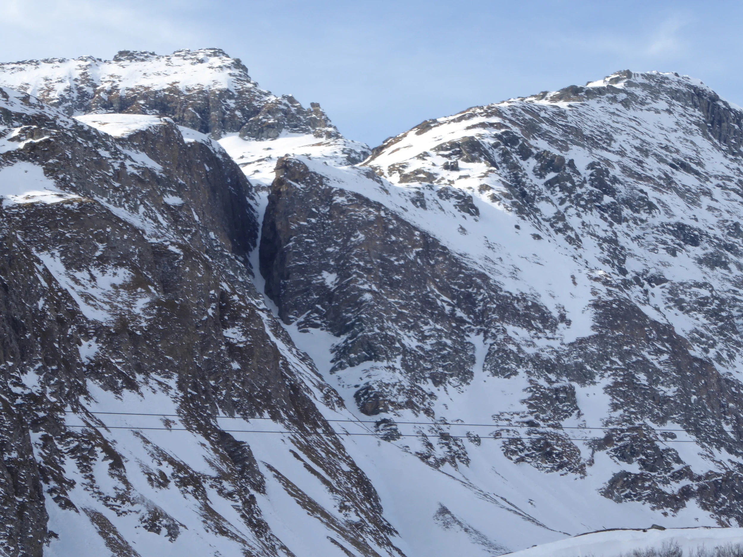 we skied the awesome tight couloir between those two hefty cliffs. it was one of the coolest lines I have ever skied!