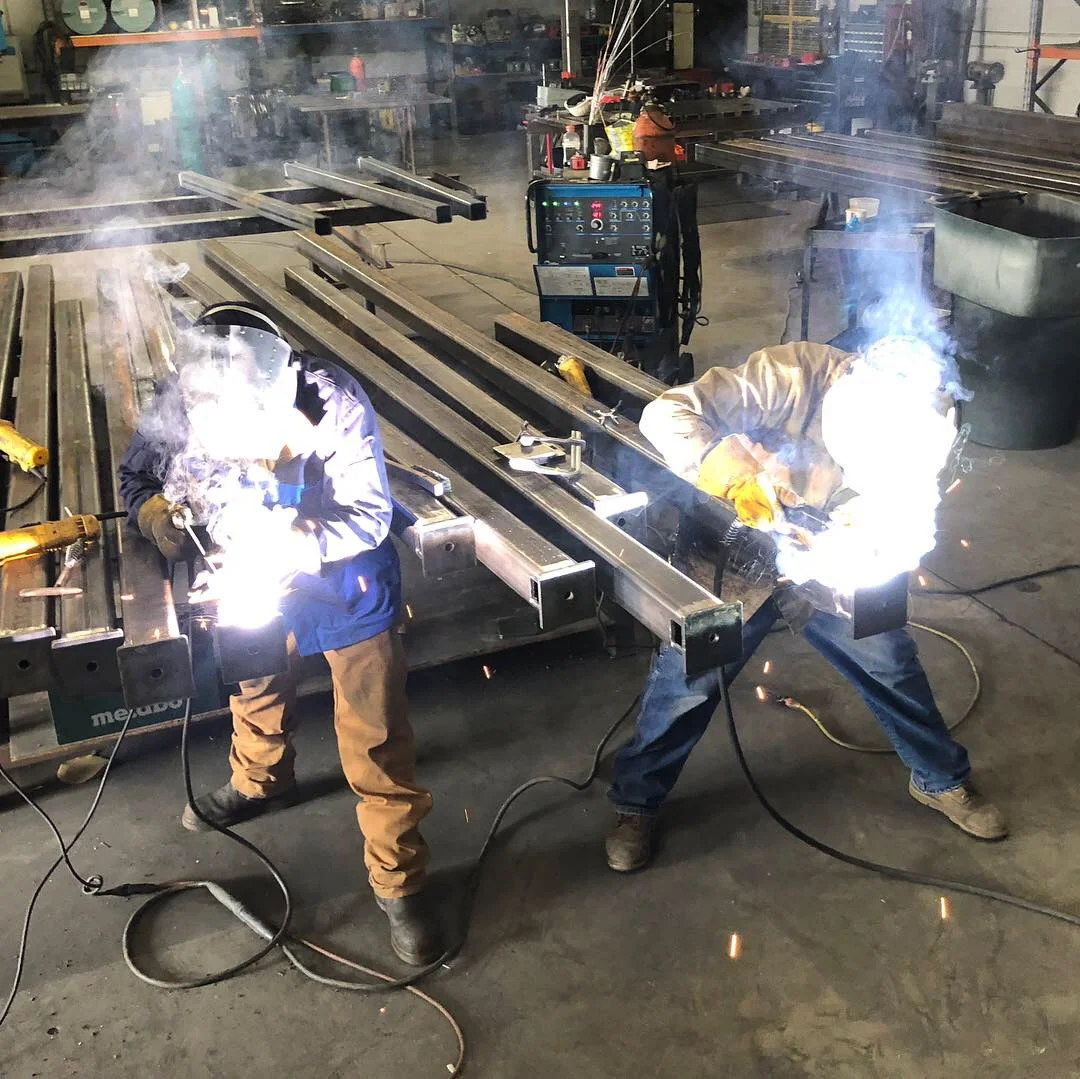 Ryan and Kasdan welding structural members for Beale AFB.