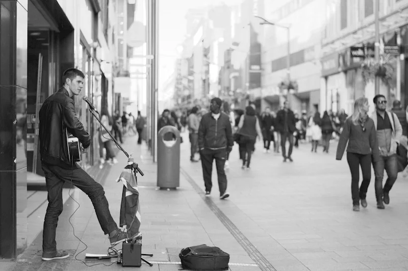 busker singing on the street