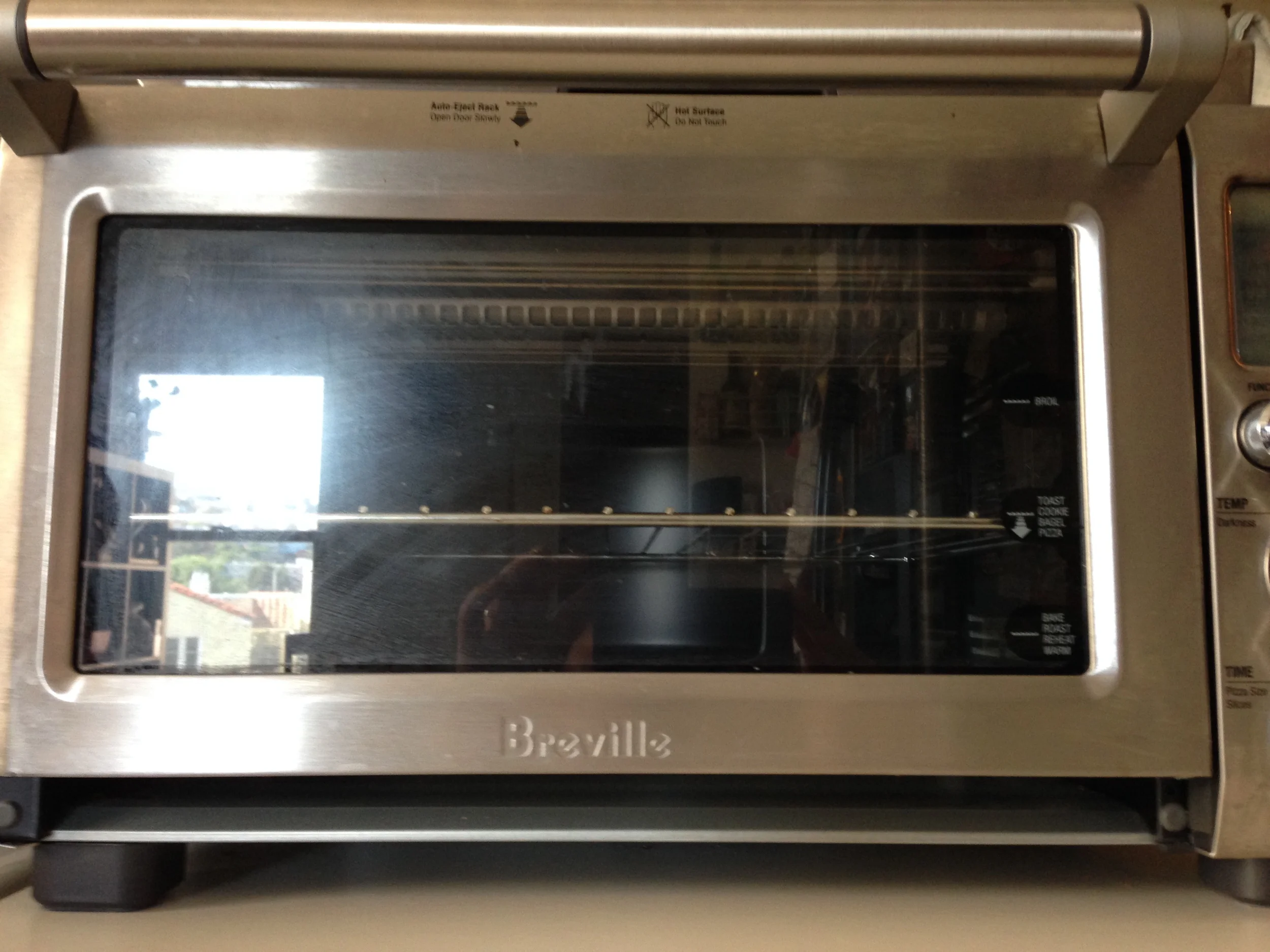 Right below the brand name of the toaster is the open space. Love it.