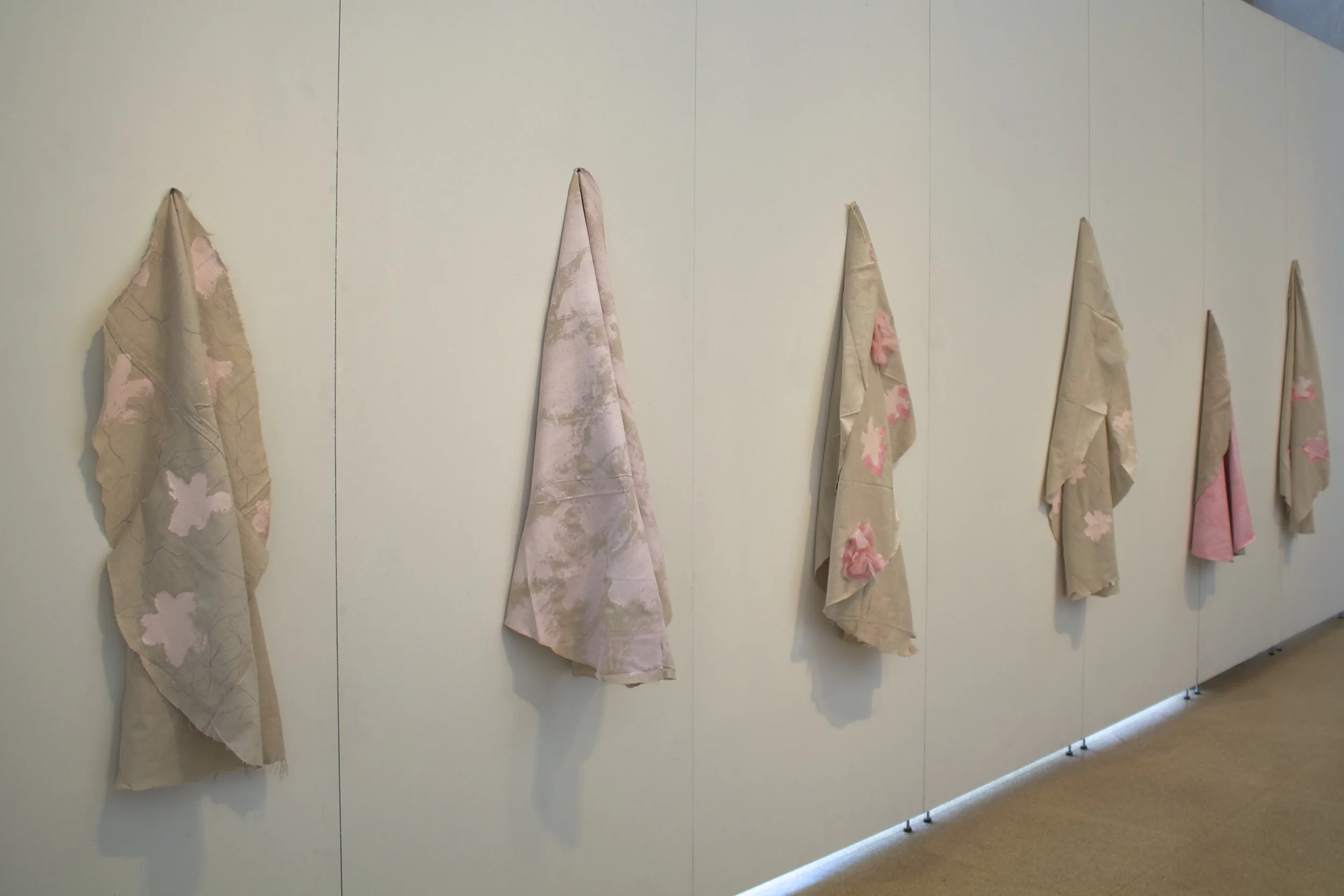 doilies canvas, latex paint, fibre glass insulation, pencil. various dimensions