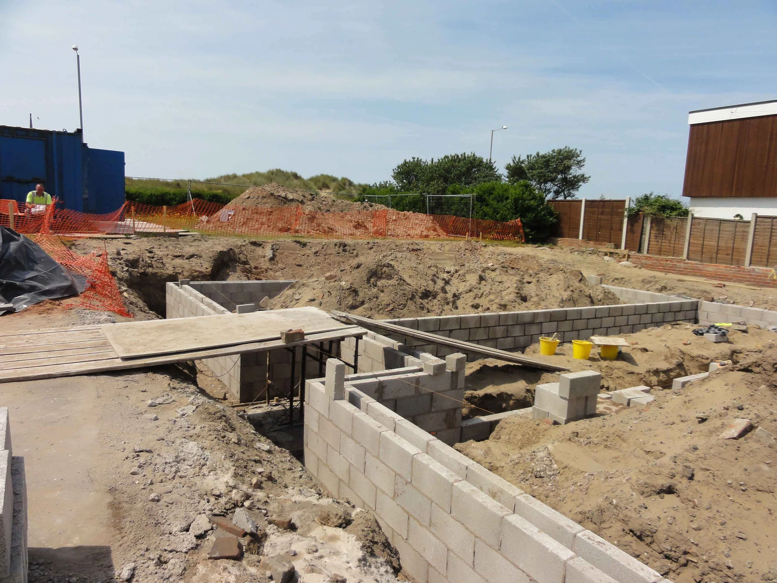 3.	Proposed foundations cast and the start of the blockwork walls. 