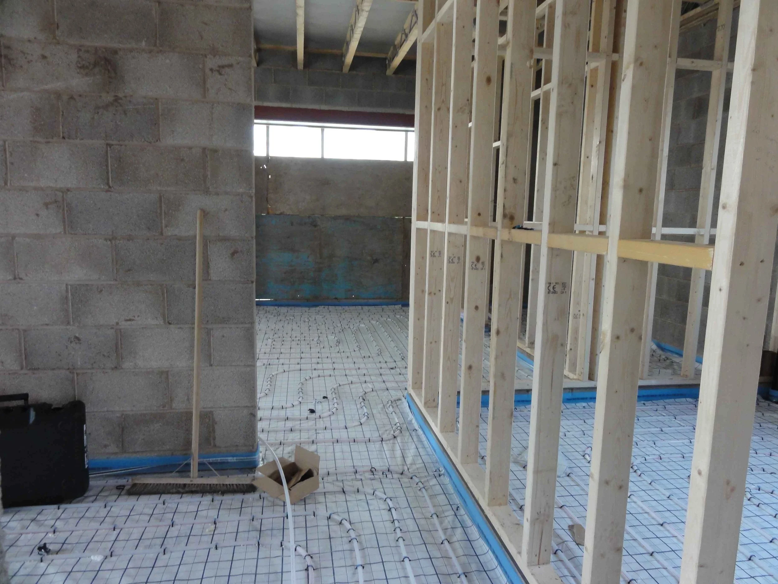 9.	Internal fit-out under way, including under floor heating. 