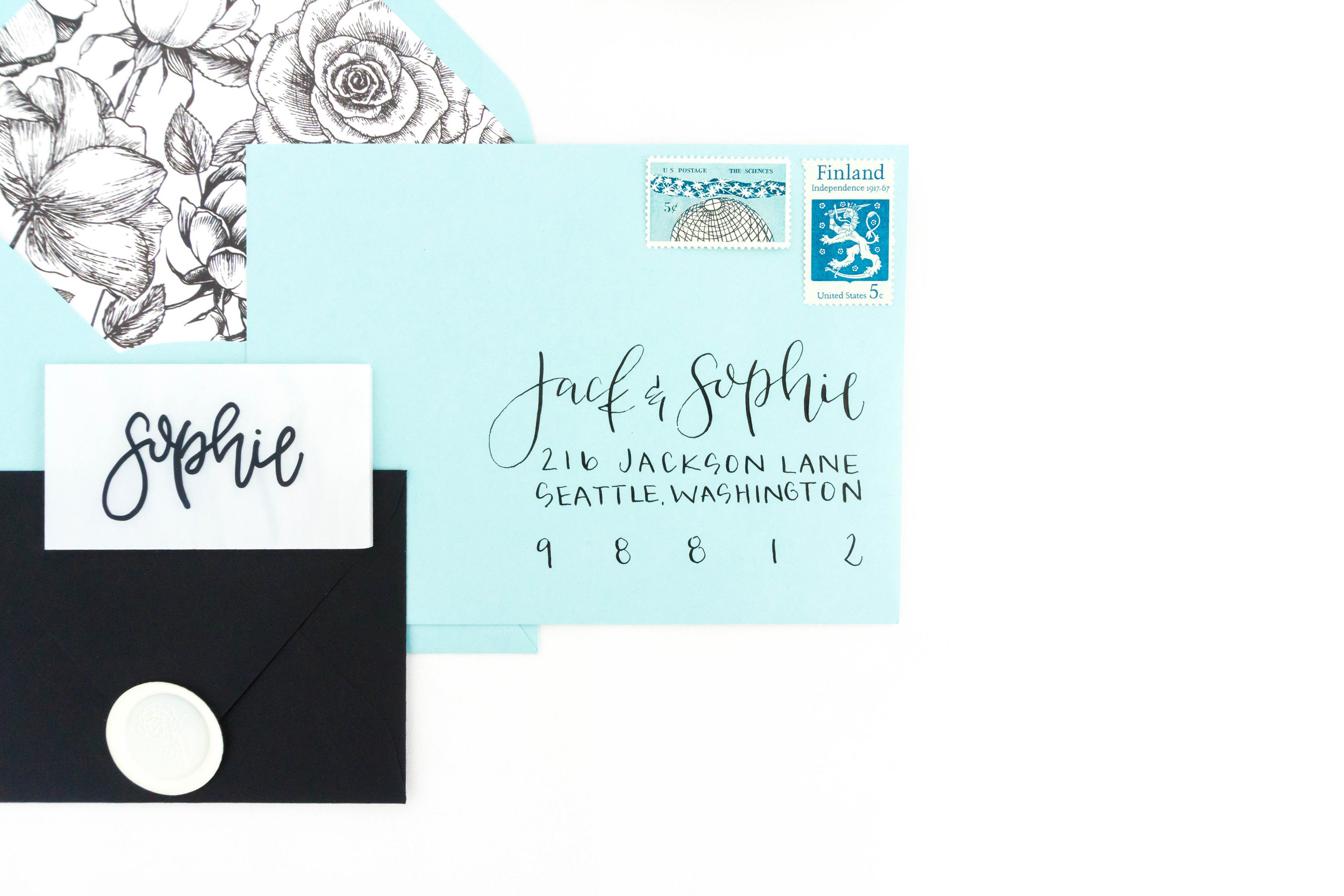 love-fern-design-studio-custom-wedding-invitations-for-the-modern-couple-modern-calligraphy-in-seattle-washington-custom-wedding-stationery-teal-envelopes-with-floral-liner-and-wax-seal