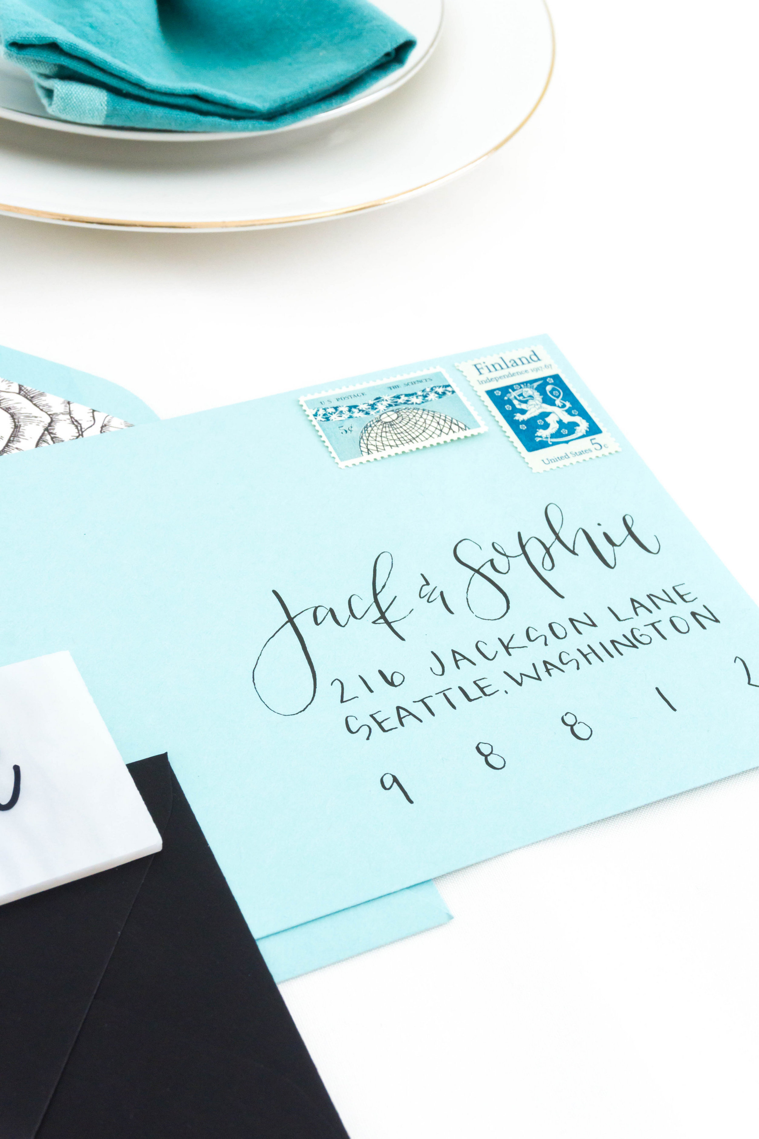 love-fern-design-studio-custom-wedding-invitations-for-the-modern-couple-modern-calligraphy-in-seattle-washington-custom-wedding-stationery-teal-and-black-calligraphy-envelopes