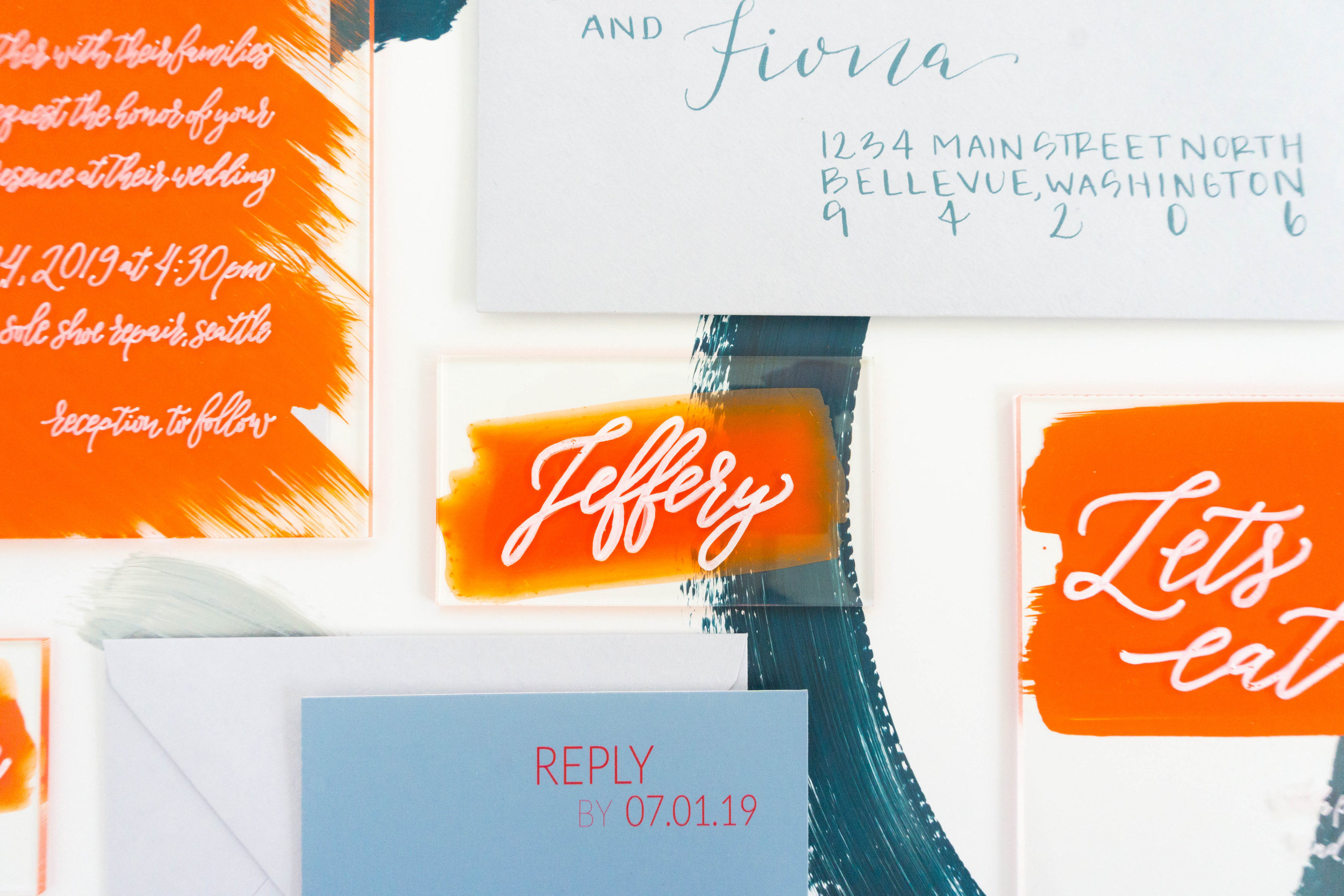 love-fern-design-studio-custom-wedding-invitations-for-the-modern-couple-modern-calligraphy-in-seattle-washington-custom-wedding-stationery-orange-acrylic-invitation-suite-acrylic-menu-and-place-cards