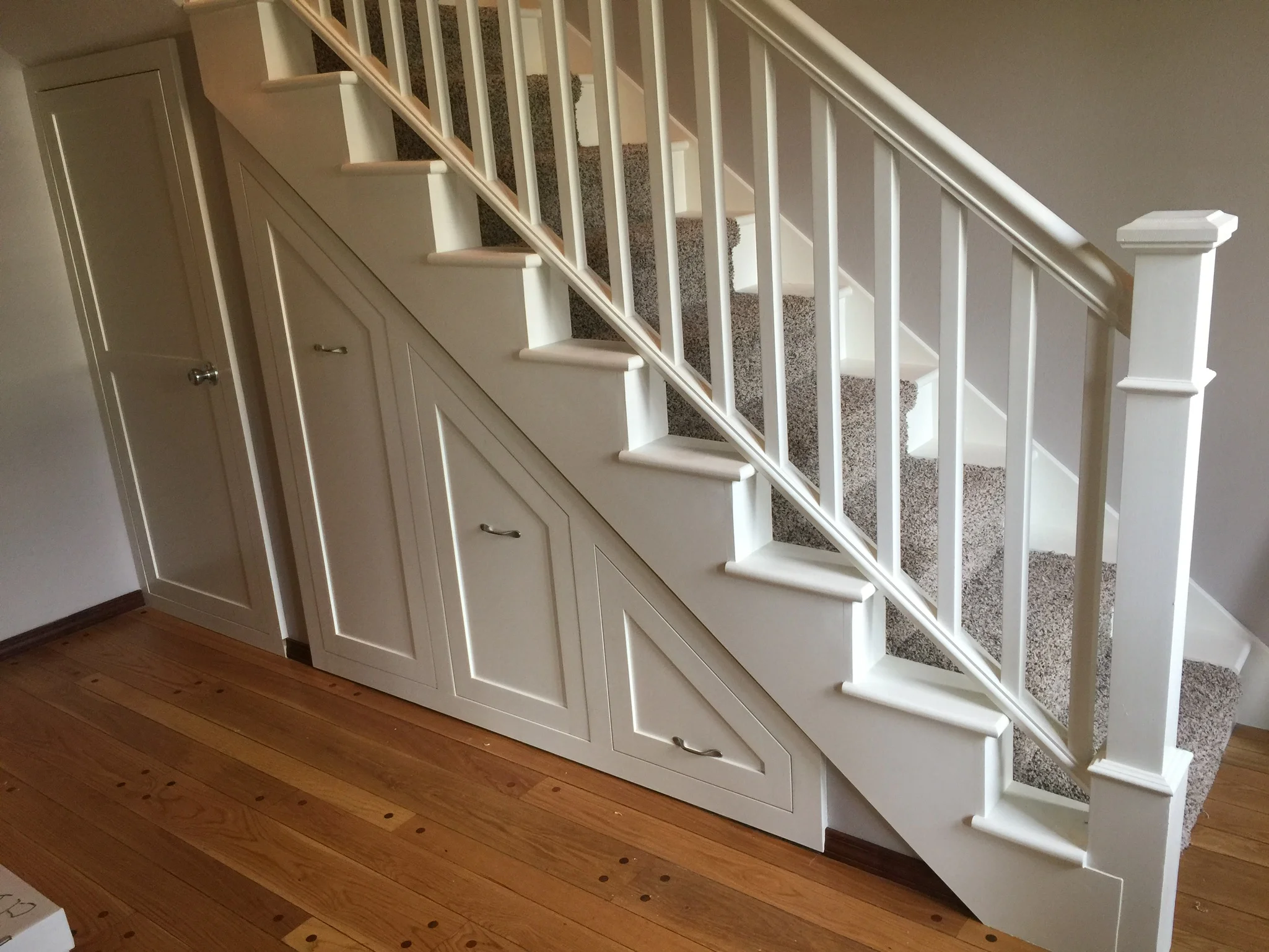 Custom understair cabinetry