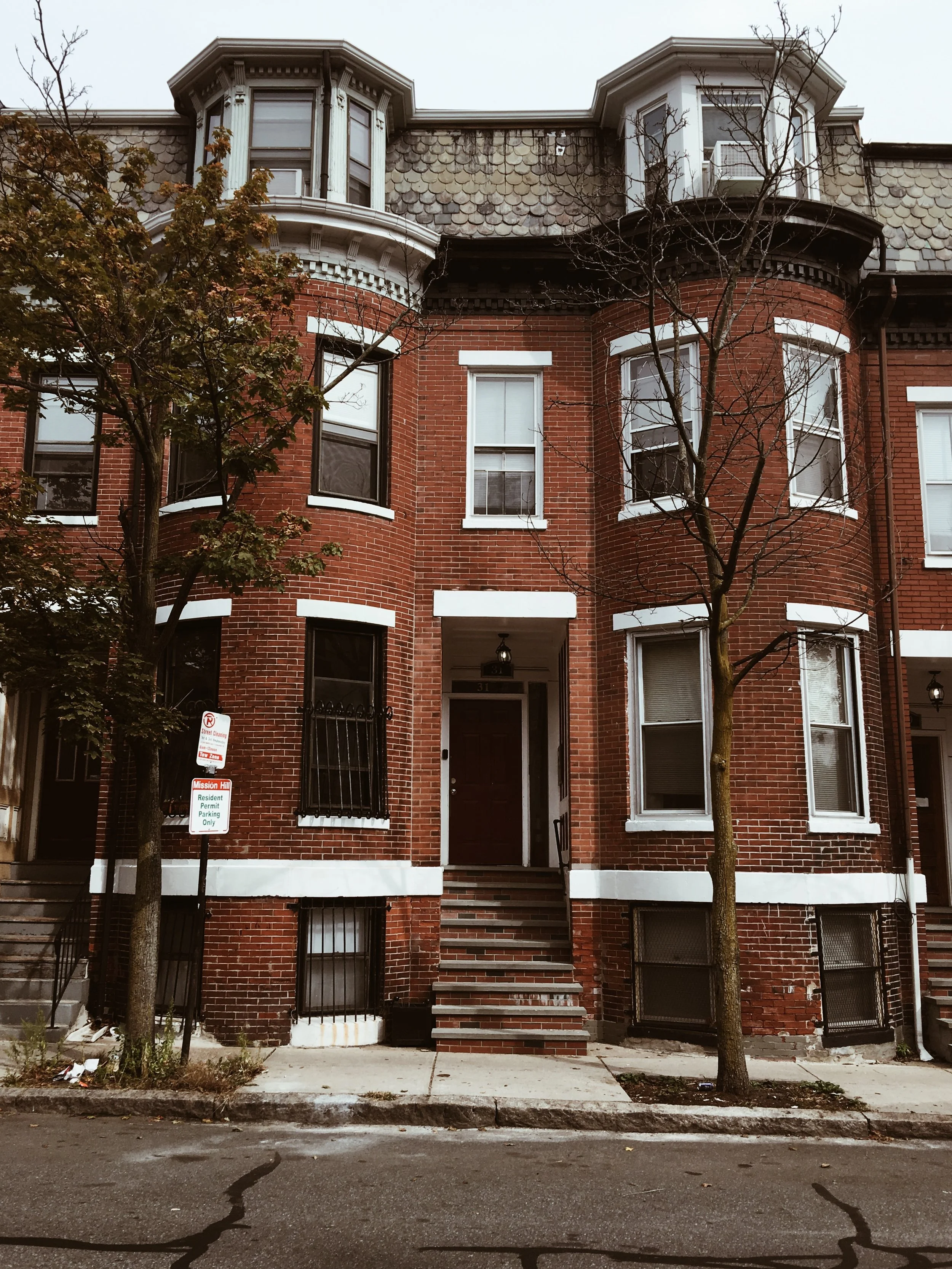 Our little stoop in Mission Hill. Scout has been enjoying looking out of the window and smelling all of the Boston smells. She also loves walking all over with us.