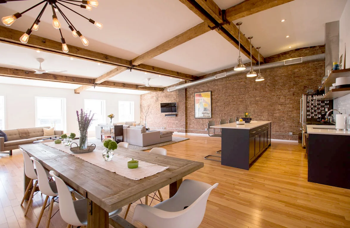 BROOKLYN LOFT The Brooklyn Loft is located on the fourth floor of a former industrial building on Atlantic Avenue in Brooklyn, New York. This interior renovation created a 2 bedroom, 2.5 bath apartment out of a single open floor plan. Original wooden beams, steel beam ties, and brick walls were excavated from behind layers of old sheetrock and plaster. Finishes and detailing were kept clean and uncluttered resulting in a warm, comfortable, and light-filled home. Photo Credits : Lexi Van Valkenburgh Photography