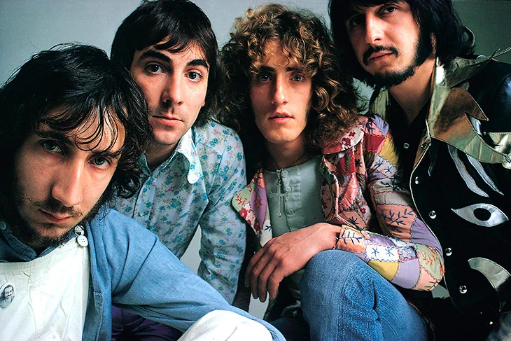 From left to right: Pete Townshend (Guitar, Keyboards, Synthesizers, Songwriter), Keith Moon (Drums), Roger Daltrey (Vocals), John Entwistle (Bass)