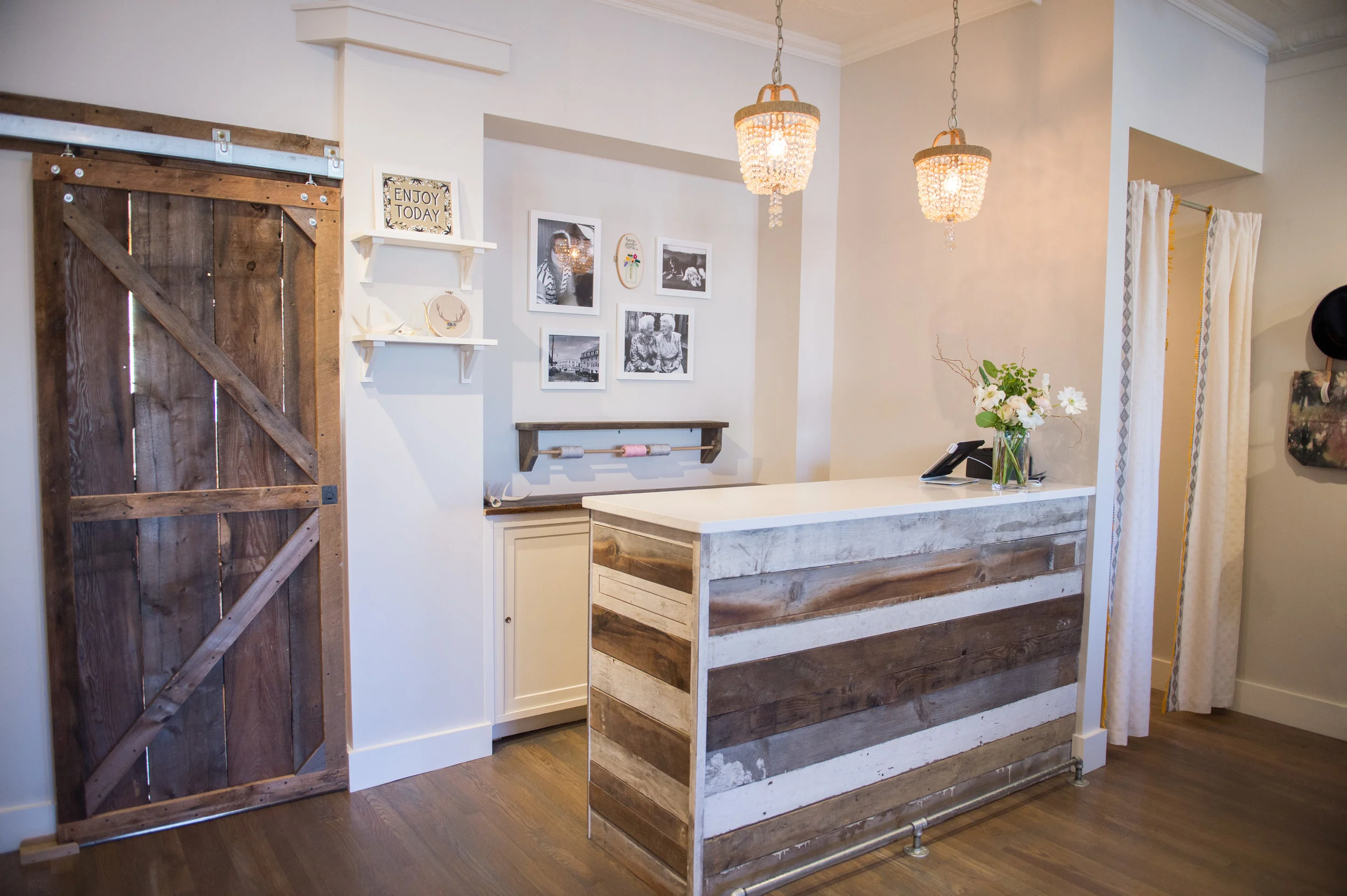 Gray floors paired nicely with barn board, supplied by the shop owner's family.