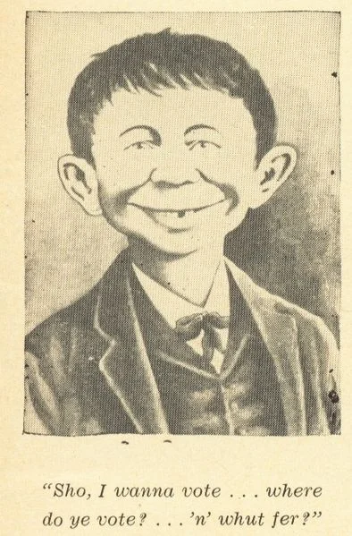 394px-1941AlfredENeuman.jpg