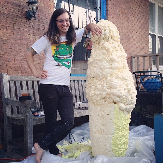  My first attempt at making a sculpture. This is a 5 foot tall ice cream cone I made out of a wooden stool, chicken wire, plaster, spray foam, spray paint and giant googly eyes for an art show I had at Little Baby's Ice Cream in the Fishtown section 