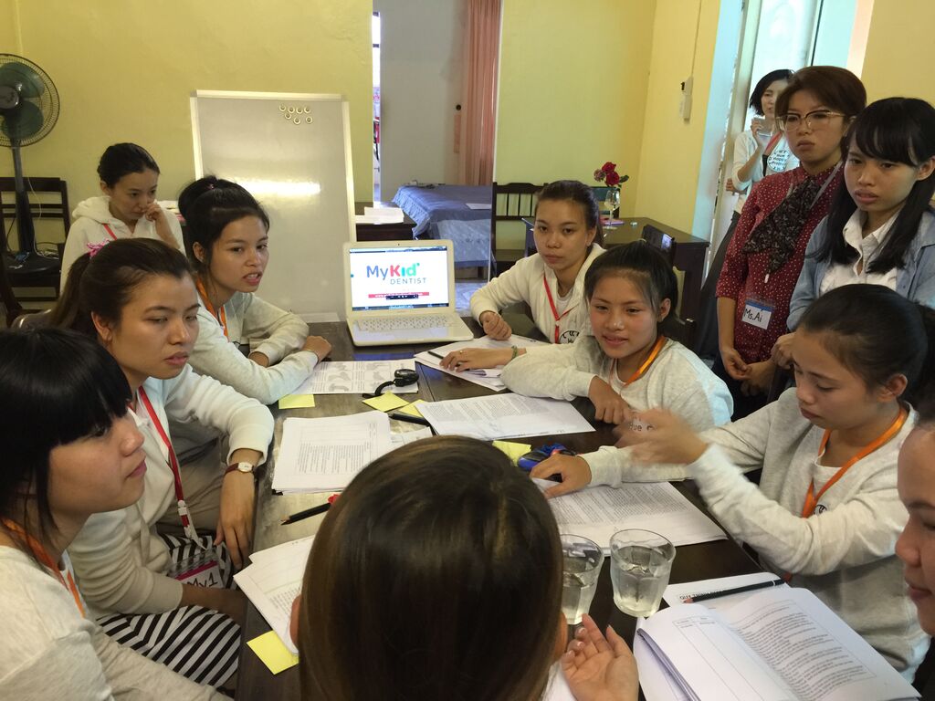 Giving the artisans tips on teaching
