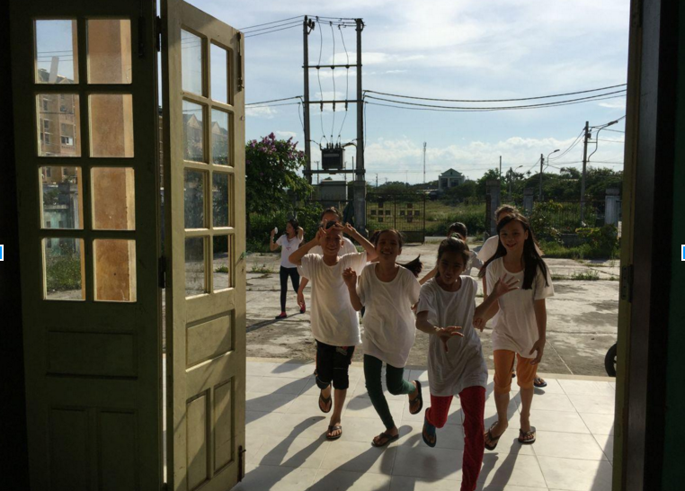 Kids welcoming us in the community building