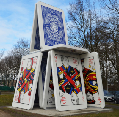 THE DECLINE / 2016 The "Decline" is a 60-ton construction shows a house of cards made of nine concrete play cards and has a scale of thirty five feet high and nineteen and a half feet wide. The construction is literally as big as a house. The traditional images on the cards are replaced by a selection of historical figures, world leaders and dictators. The selected images and the shape of the cards are being presented as a metaphor Read more