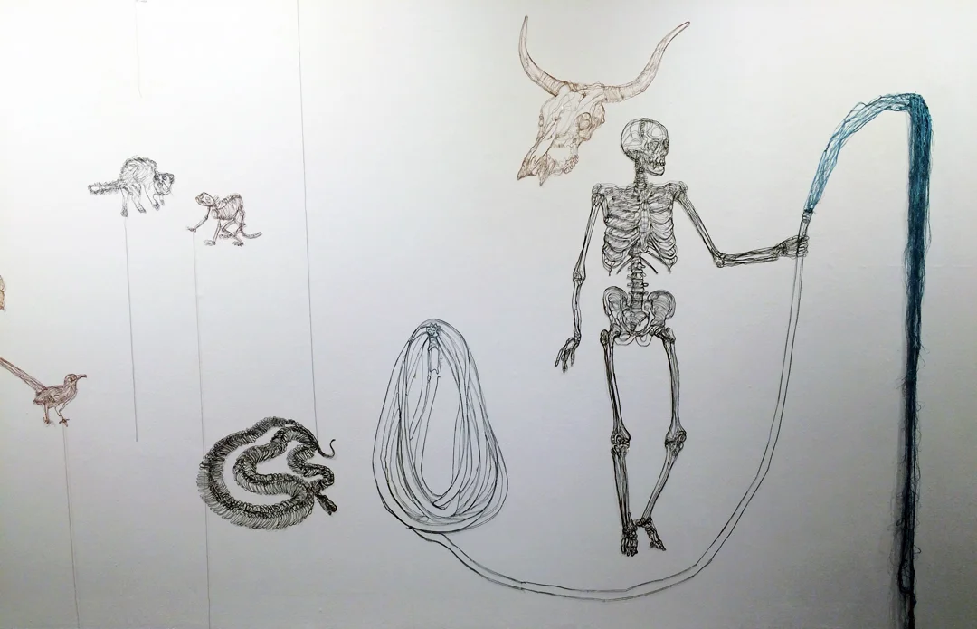 unraveledriver_web_skeletonwall.jpg