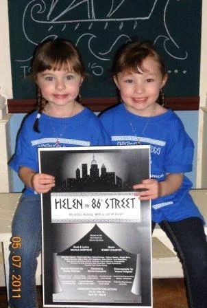 2 girls with poster.jpg