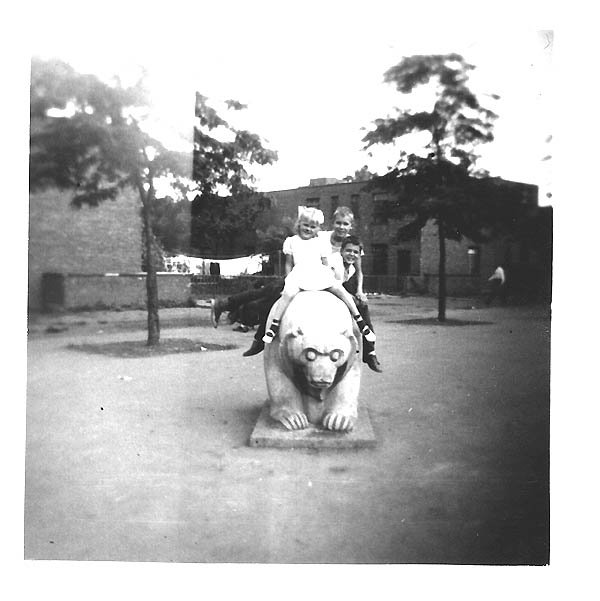 Kids on statue, 1940s_.jpg