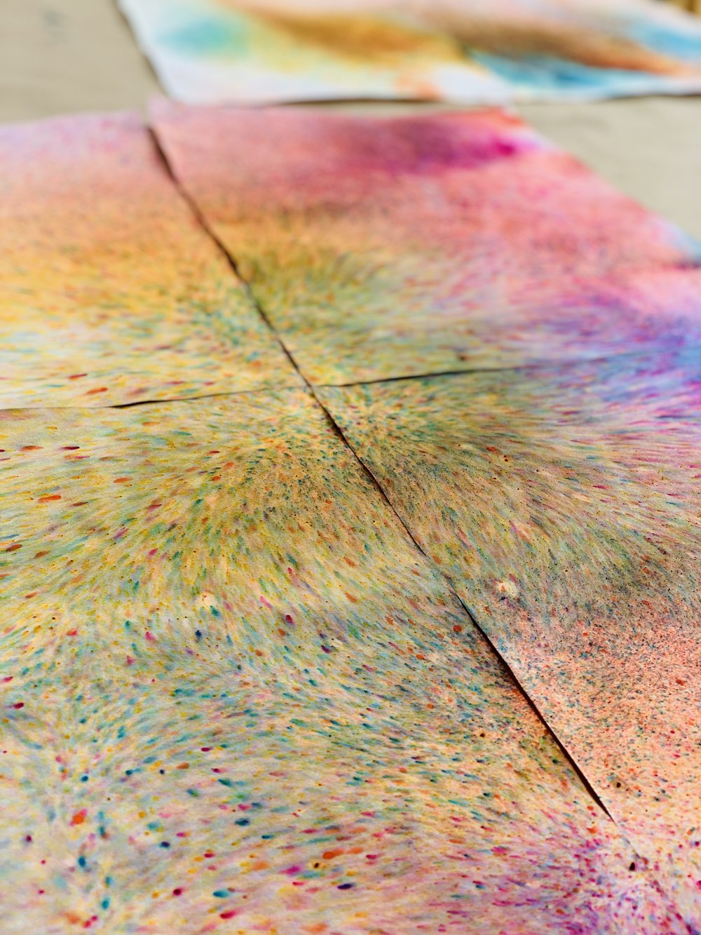  Three photographs of Marisa Morán Jahn’s vibrant hand-dyed rainbow wallpaper tiles.  