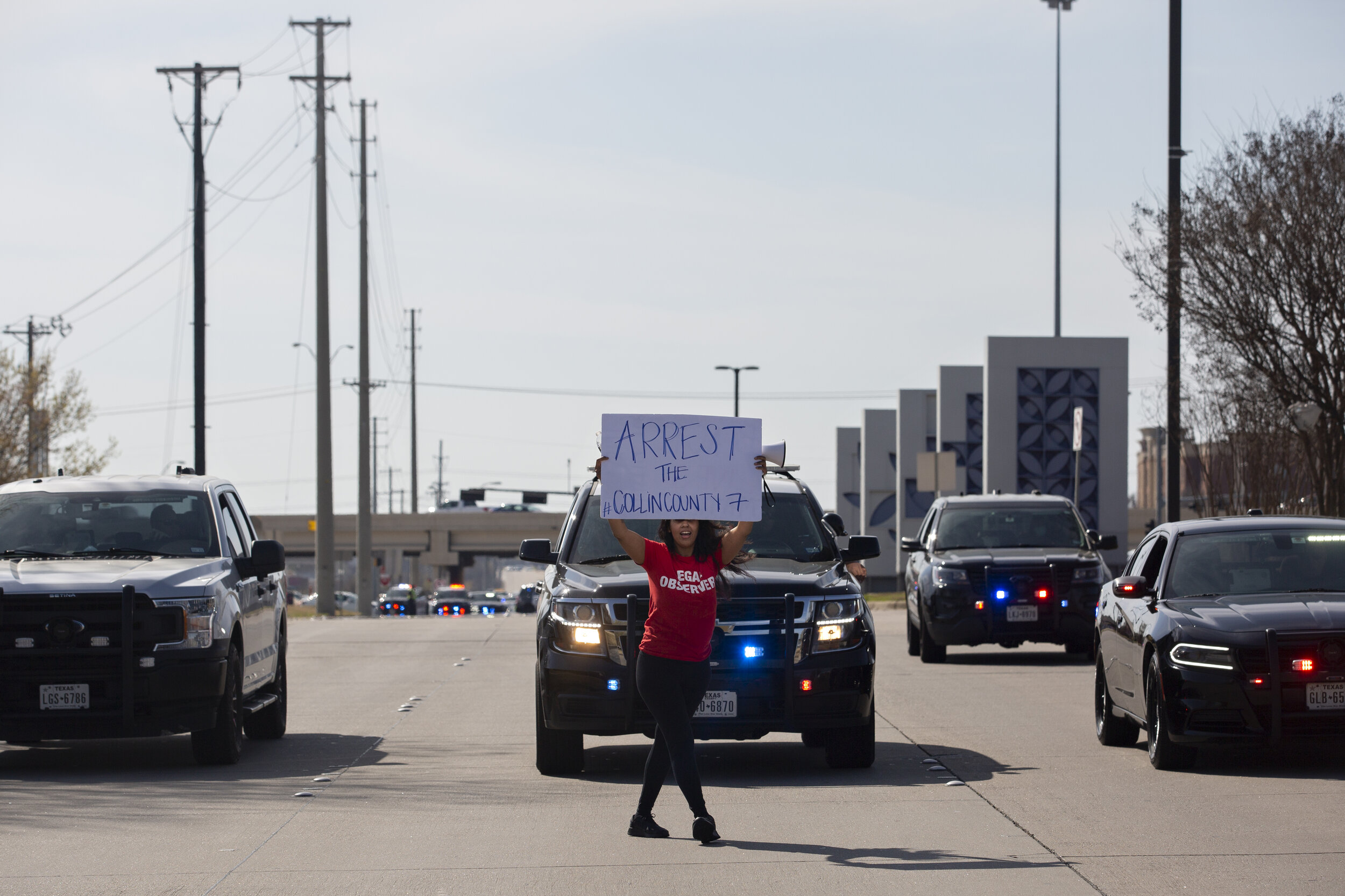  Renee White dances down the street as the tail end of the march leaving the Allen Outlets.  