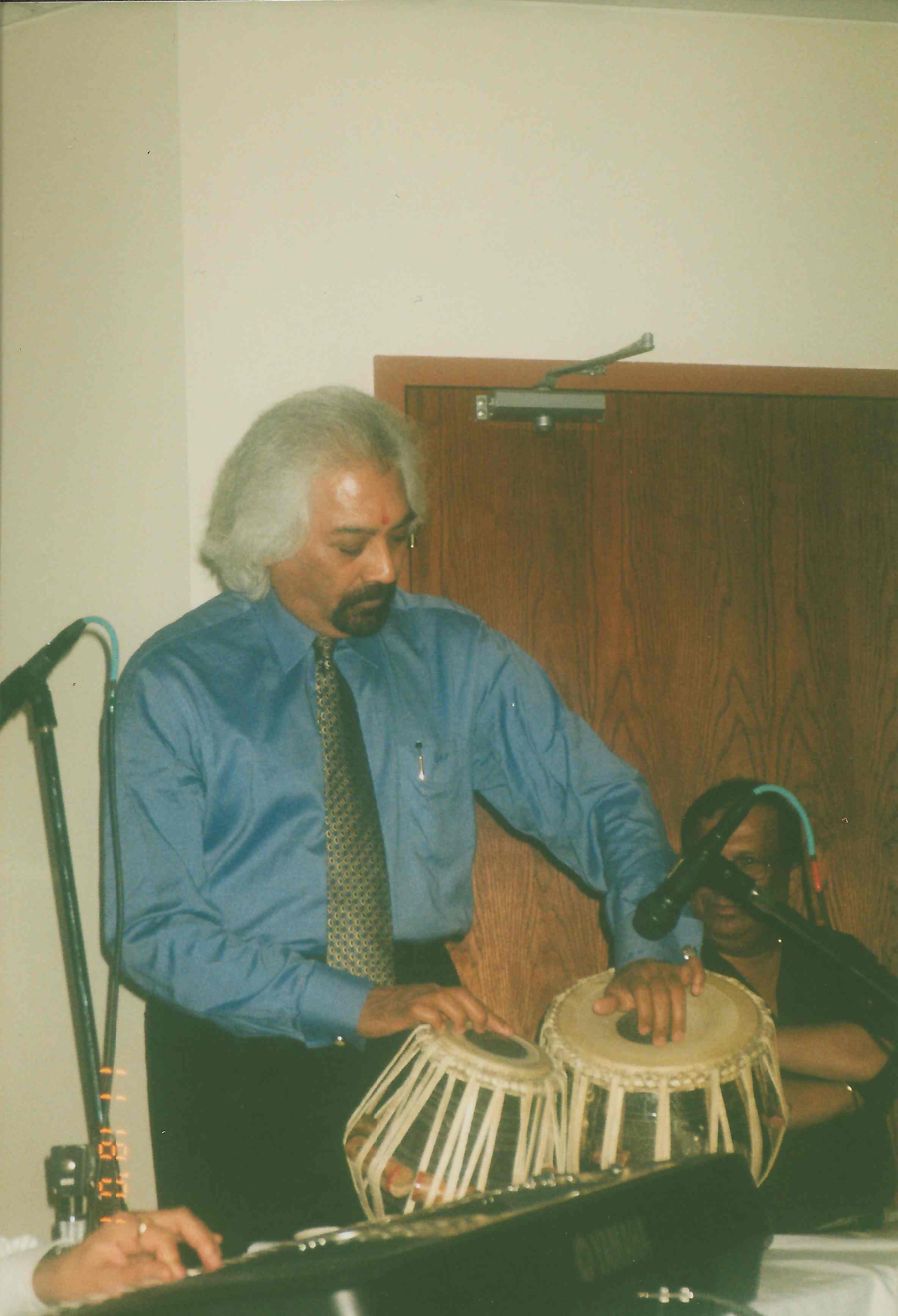 Sam playing tabla