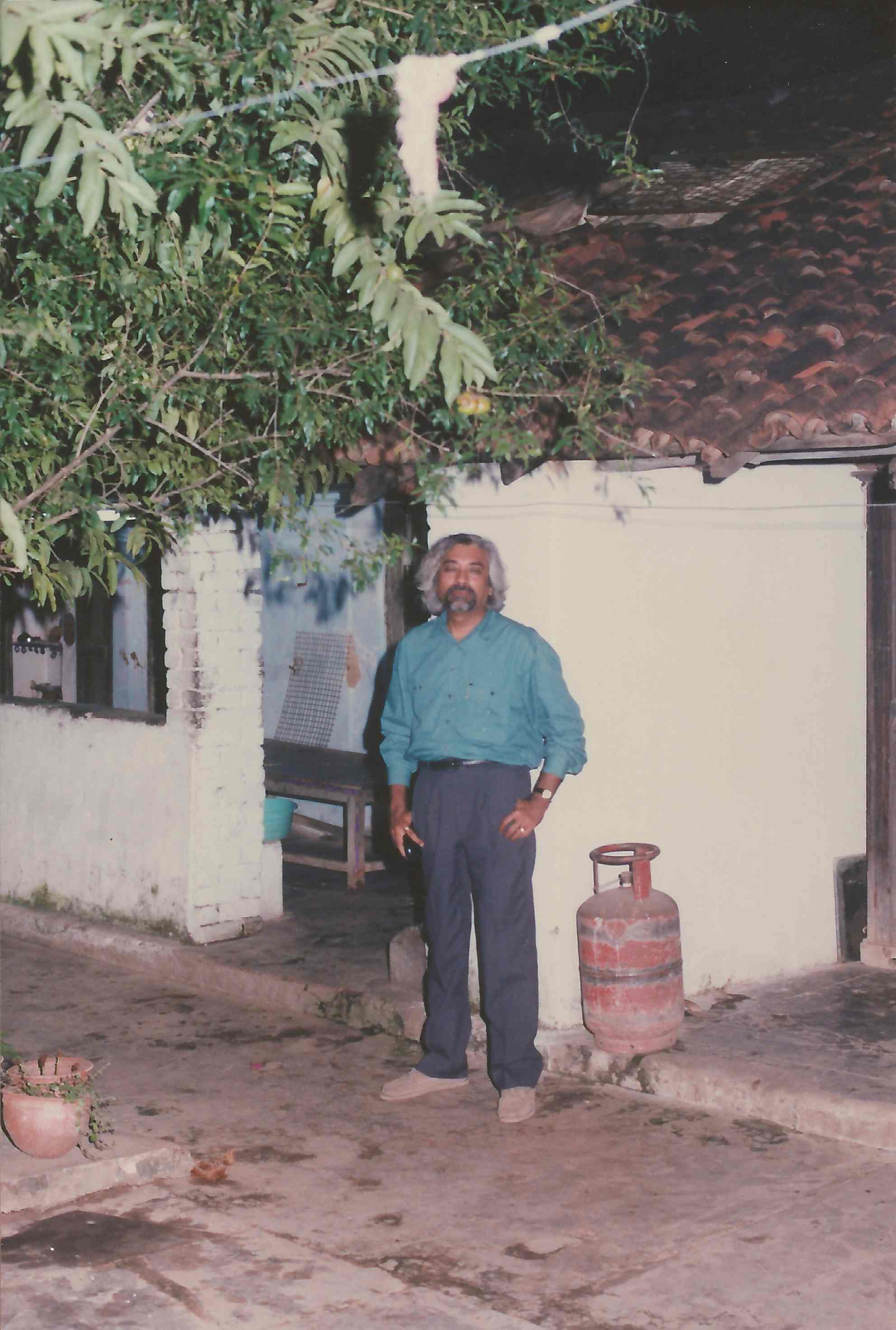 Sam at the house where he was born, Titilagarh, Orissa